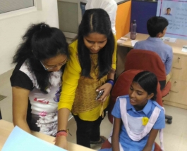 ISYS Softech company Employees interacting with rural students